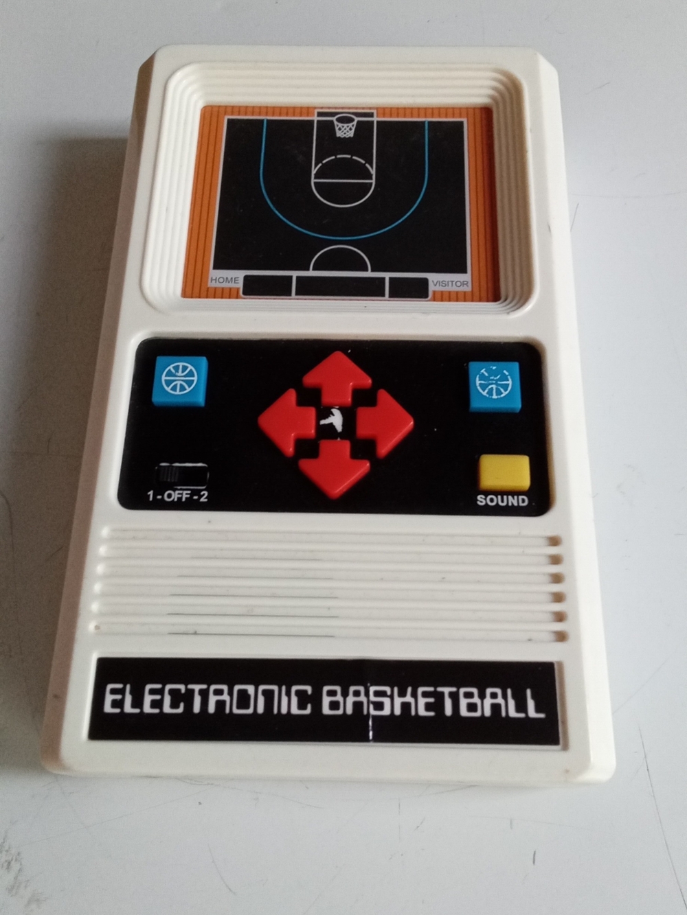 Mattel White Electronic Basketball Handheld Game with Red Controls